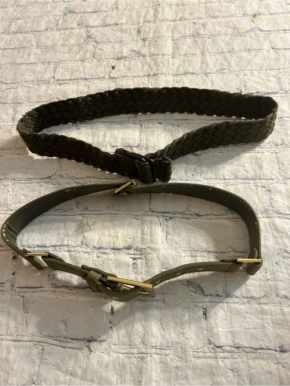 OLIVE GREEN WOVEN AND OLIVE GREEN WITH GOLD TONE HARDWARE (2) BELTS